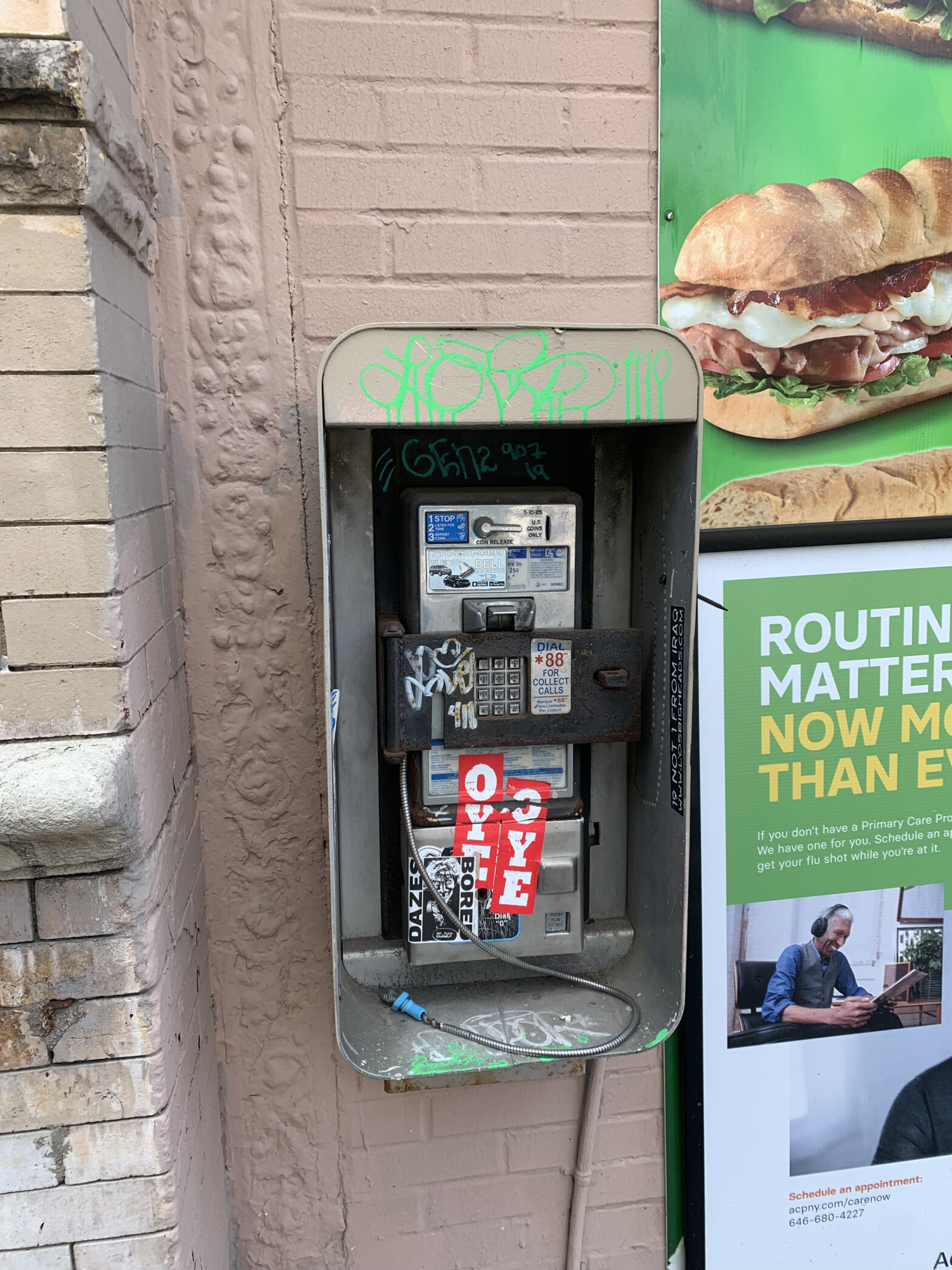 defunct public phone in Brooklyn
